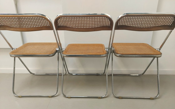 Image 1 of 3x Castelli Plia folding cane chair by Giancarlo Piretti