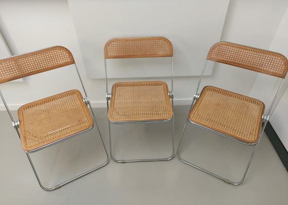 Image 1 of 3x Castelli Plia folding cane chair by Giancarlo Piretti