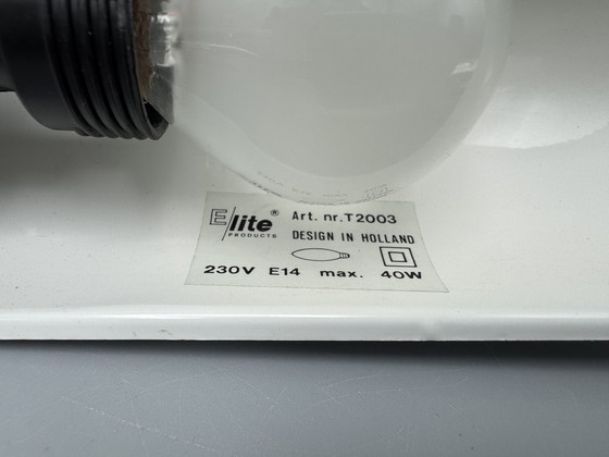 Image 1 of Lámpara de escritorio E-Lite con brazo flexible y soporte para clips en la base, circa 1970