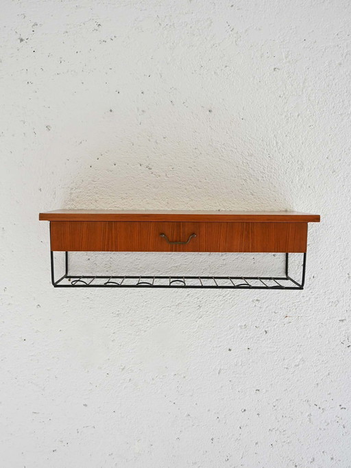 Comodino vintage scandinavo sospeso in teak con cassetto e ripiano