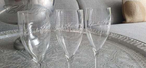 Image 1 of 23x Champagne glasses from mumm to Veuve Clicquot