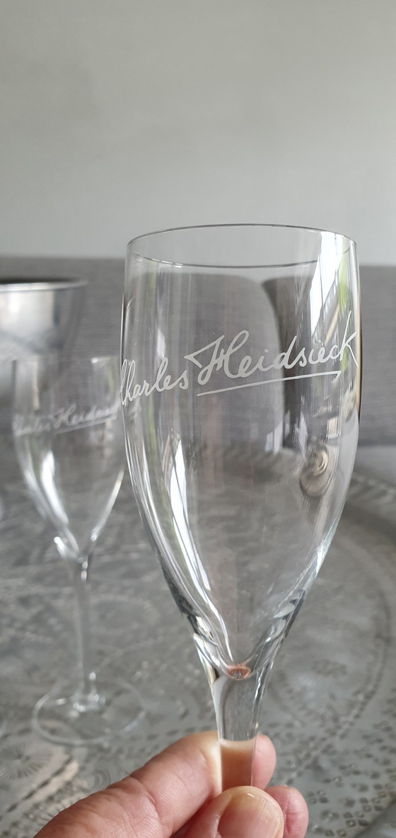 Image 1 of 23x Champagne glasses from mumm to Veuve Clicquot