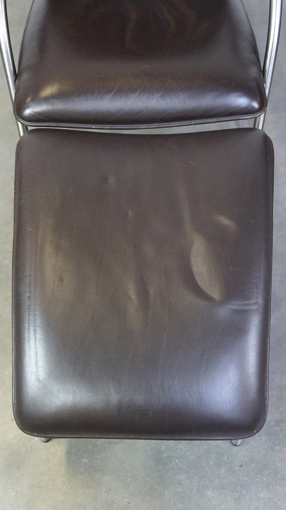 Image 1 of Fauteuil et pouf design en cuir brun foncé, De Sede DS 270