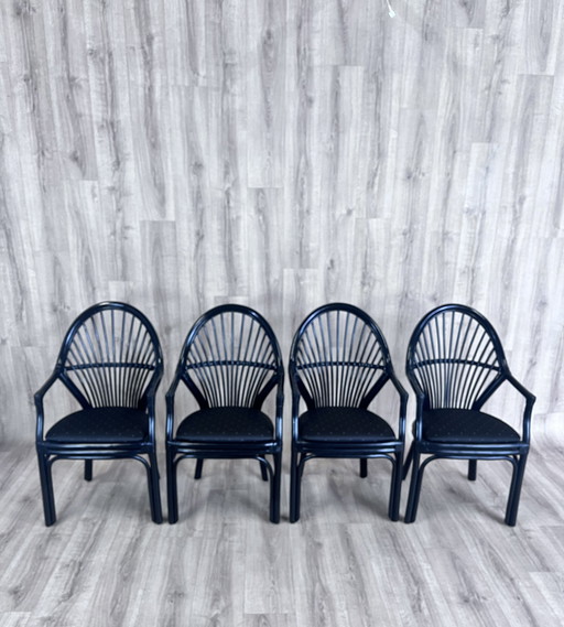 Four rattan chairs