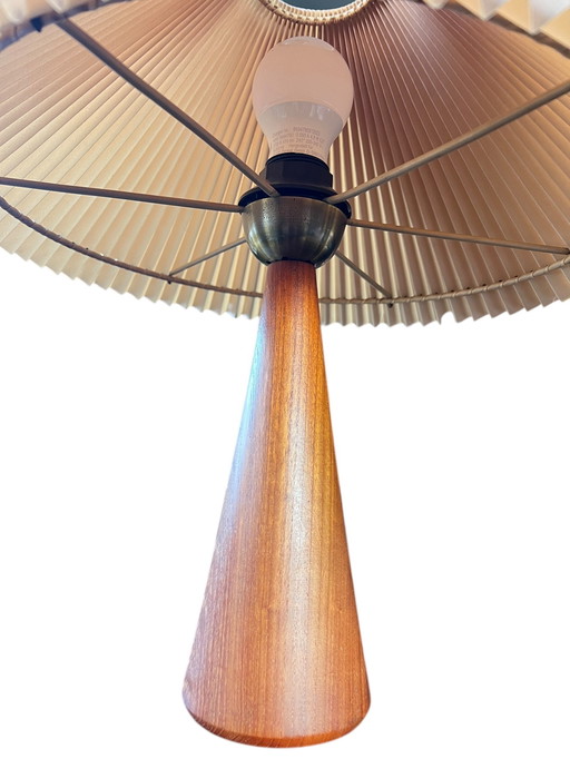 NK - Nordiska Kompaniets Mid - Century Table Lamp With Teak Base And Ruffled Plastic Shade From The 1960s