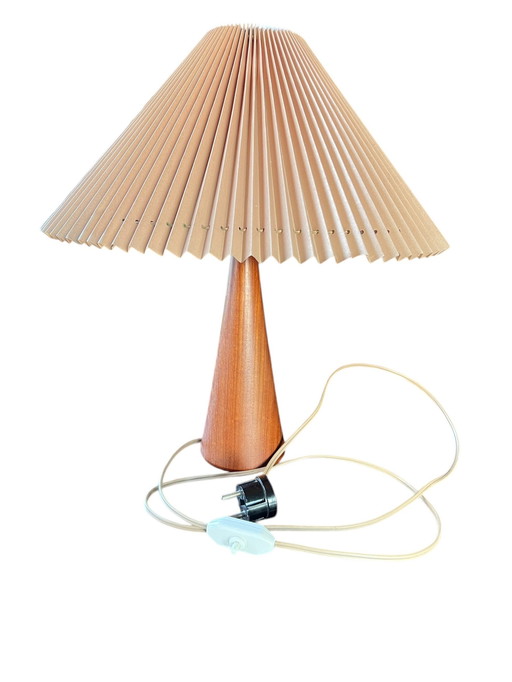 NK - Nordiska Kompaniets Mid - Century Table Lamp With Teak Base And Ruffled Plastic Shade From The 1960s