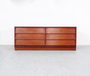 Vintage low teak sideboard with drawers from the 1960s