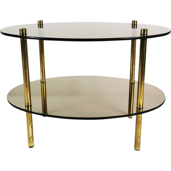 Vintage minimalist oval coffee table in brass and glass Germany 1960 270 Whoppah