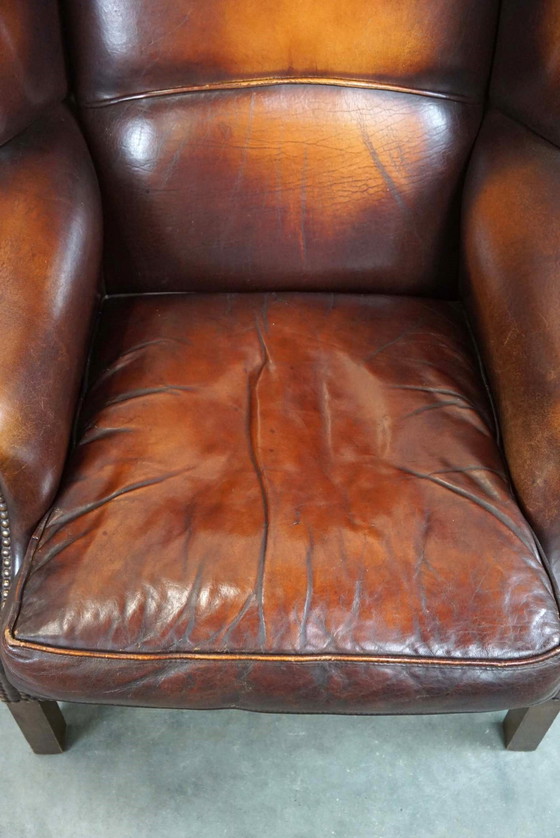 Image 1 of Fauteuil à oreilles en cuir de mouton