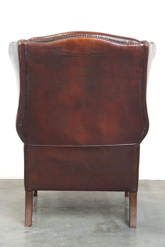 Image 1 of Fauteuil à oreilles en cuir de mouton