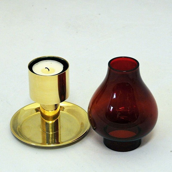 Image 1 of Scandinavian vintage candlestick in red glass and brass, 1960