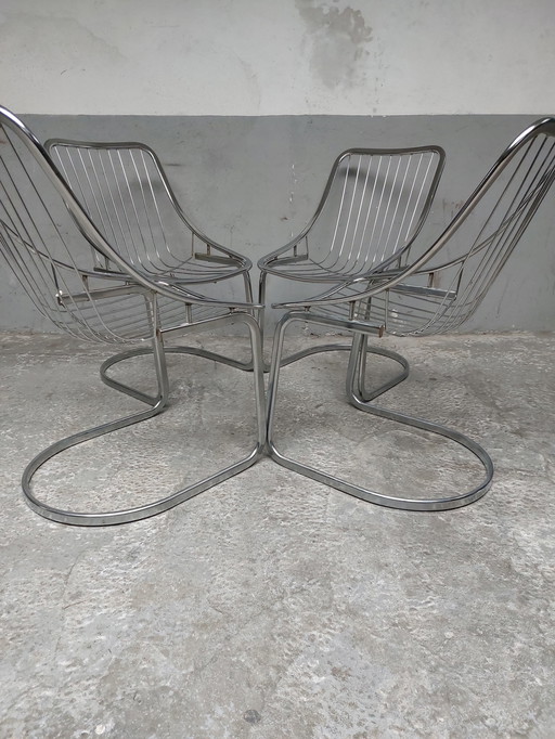 4x chrome tubular cantilever dining chairs