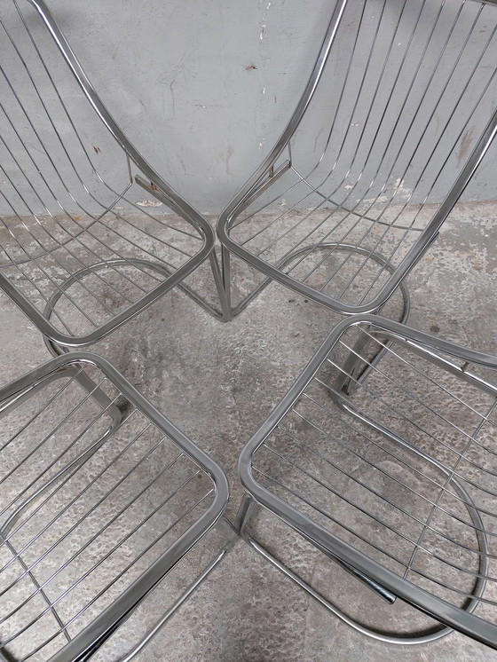 Image 1 of 4x chrome tubular cantilever dining chairs