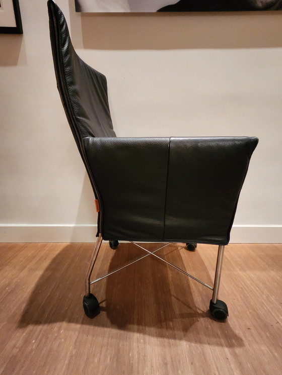 Image 1 of 6 X Montis Dining Chairs Black Leather, Stainless Steel Base With Wheels