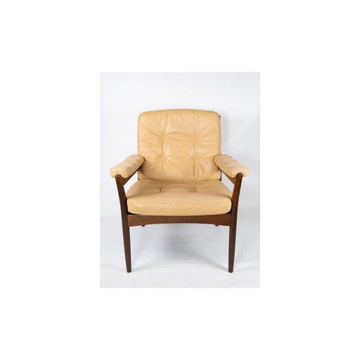 Vintage Armchair in dark wood and upholstered with leather, Danish 1960s