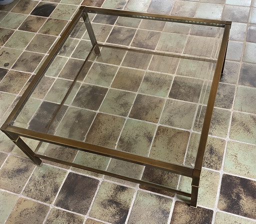 Coffee table with faceted glass