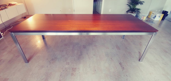 Image 1 of Design dining table with stainless steel frame with wooden top