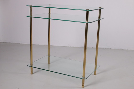 Image 1 of Hollywood Regency Side Table with gold legs.