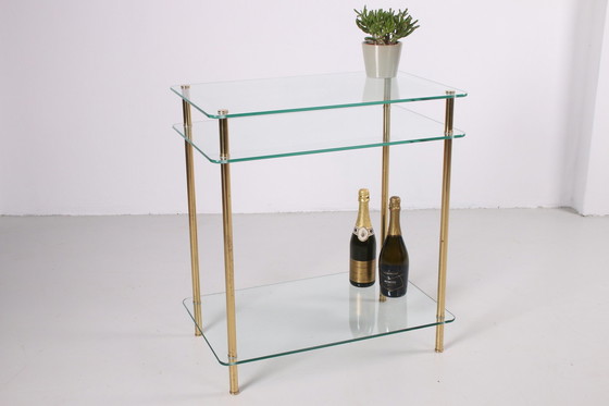 Image 1 of Hollywood Regency Side Table with gold legs.