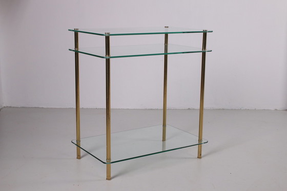 Image 1 of Hollywood Regency Side Table with gold legs.