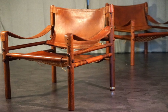 Image 1 of Scandinavian vintage Sirocco Safari teak armchair in cognac-colored leather by Arne Norell for Arne Norell Ab, 1960s, set of 2