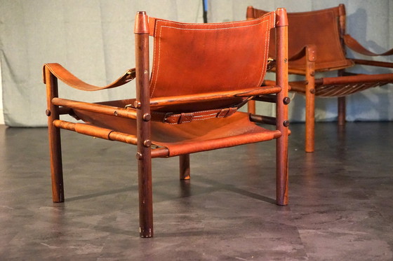 Image 1 of Scandinavian vintage Sirocco Safari teak armchair in cognac-colored leather by Arne Norell for Arne Norell Ab, 1960s, set of 2