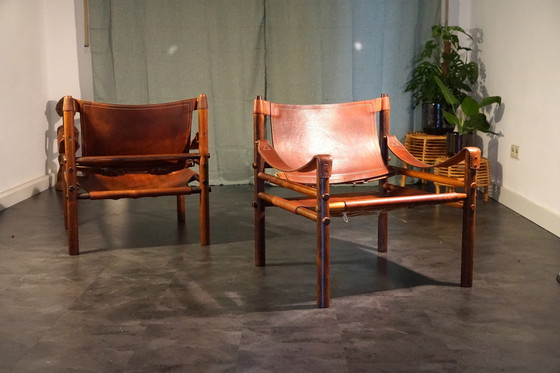 Image 1 of Scandinavian vintage Sirocco Safari teak armchair in cognac-colored leather by Arne Norell for Arne Norell Ab, 1960s, set of 2