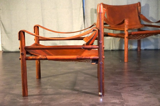 Image 1 of Scandinavian vintage Sirocco Safari teak armchair in cognac-colored leather by Arne Norell for Arne Norell Ab, 1960s, set of 2