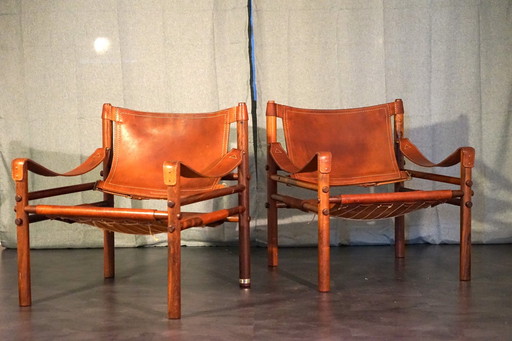 Scandinavian vintage Sirocco Safari teak armchair in cognac-colored leather by Arne Norell for Arne Norell Ab, 1960s, set of 2