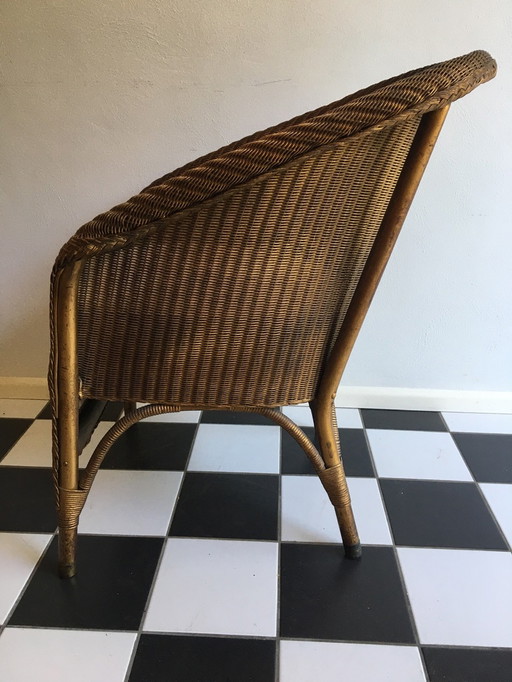 Lloyd Loom chair with cushion