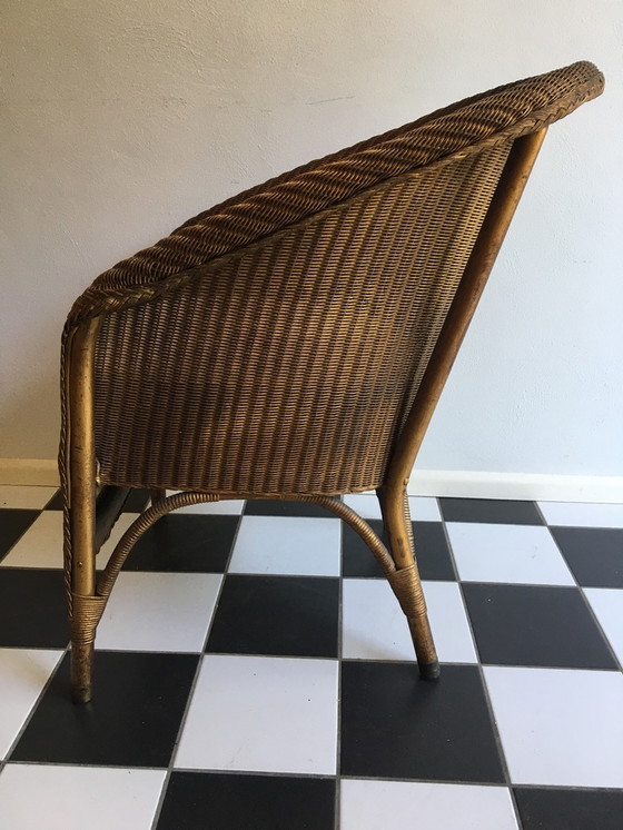 Image 1 of Lloyd Loom chair with cushion