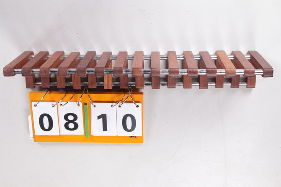Image 1 of Vintage teak wall coat rack with chrome from the 1960s.