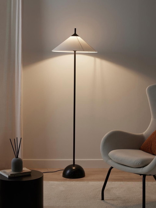 Floor lamp with a marble base