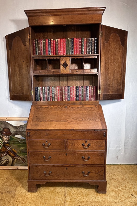 Image 1 of  Libreria vintage in rovere massello Brocante, 1880, scomparti nascosti e interni attrezzati