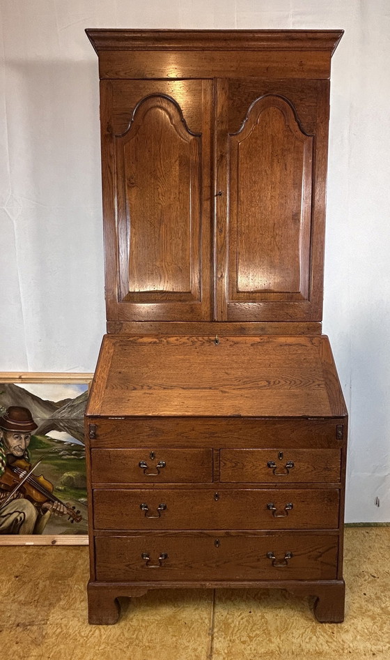 Image 1 of  Libreria vintage in rovere massello Brocante, 1880, scomparti nascosti e interni attrezzati