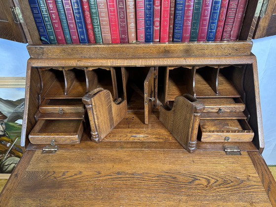 Image 1 of  Libreria vintage in rovere massello Brocante, 1880, scomparti nascosti e interni attrezzati