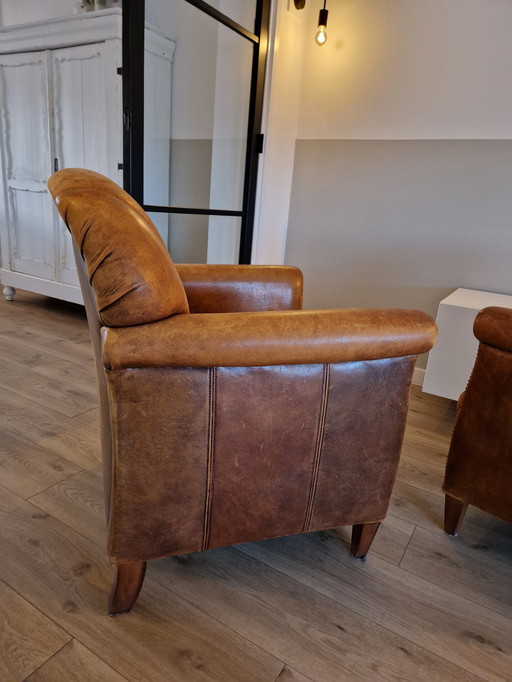 2x Vintage sheep leather armchairs