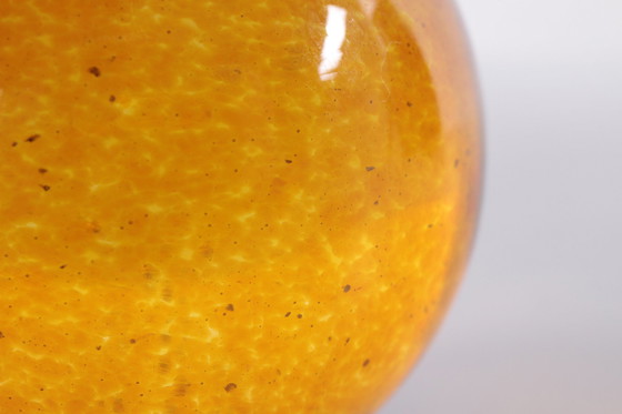 Image 1 of Glass Paperweight peach orange ball