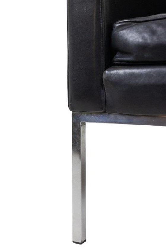 Image 1 of Pair Of Black Leather And Chrome Metal Armchairs. Circa 1970.