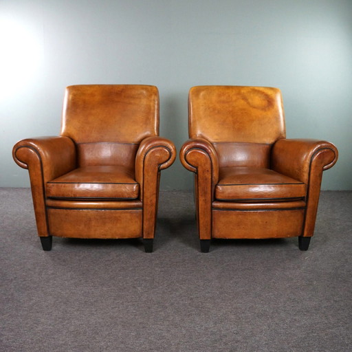 Set of two large sheep leather armchairs