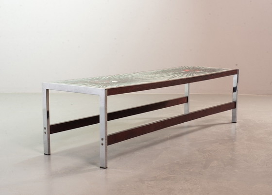 Image 1 of Grande tavolino da caffè rettangolare Denisco in ceramica, in un'esplosione di colori, su struttura cromata e in legno. Belg
