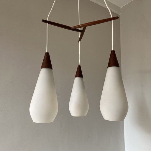 Midcentury pendant lamp of opaline glass and teak, 3-armed