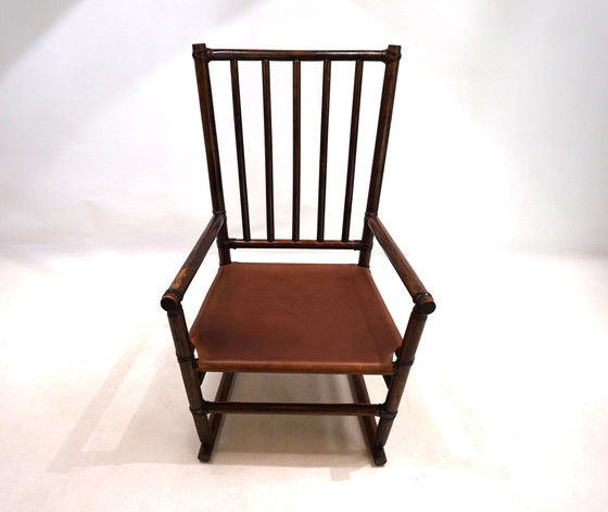 Image 1 of Fauteuil en rotin Manou avec assise en cuir, 1960