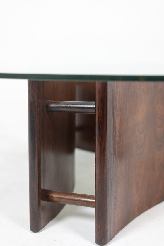 Image 1 of Concave rosewood coffee table. Circa 1970.