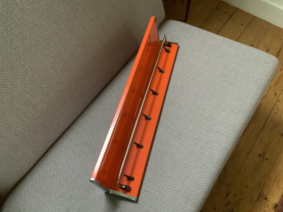 Image 1 of Brabantia Orange and Chrome Metal Towel Rack