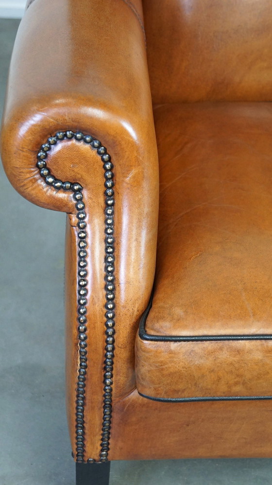 Image 1 of Fauteuil à oreilles en peau de mouton