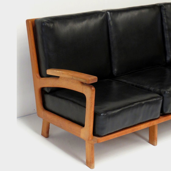 Image 1 of Vintage lounge sofa with oak frame and black leather