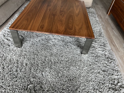 Walnut coffee table with stainless steel base