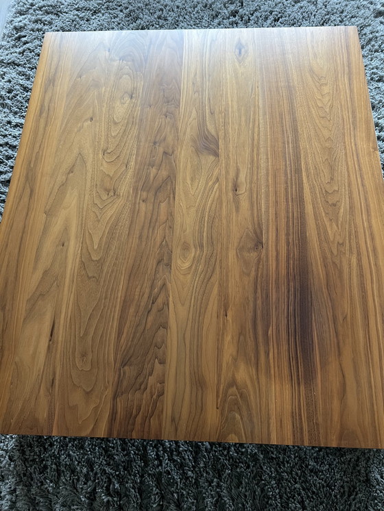 Image 1 of Walnut coffee table with stainless steel base