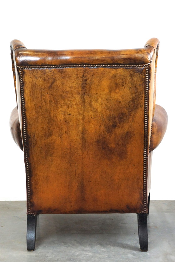 Image 1 of Fauteuil à oreilles en peau de mouton